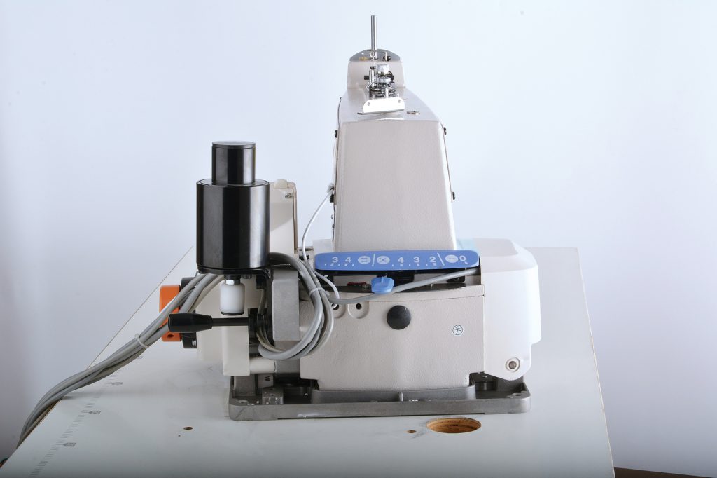 Button sewing machine